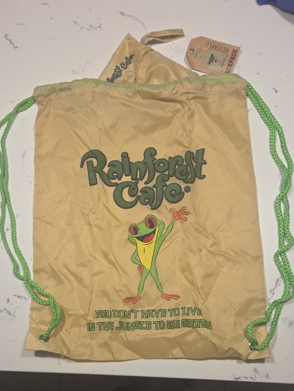 Rainforest Cafe tan Drawstring Backpack with Attached Pouch